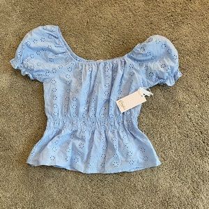 Women’s light blue blouse